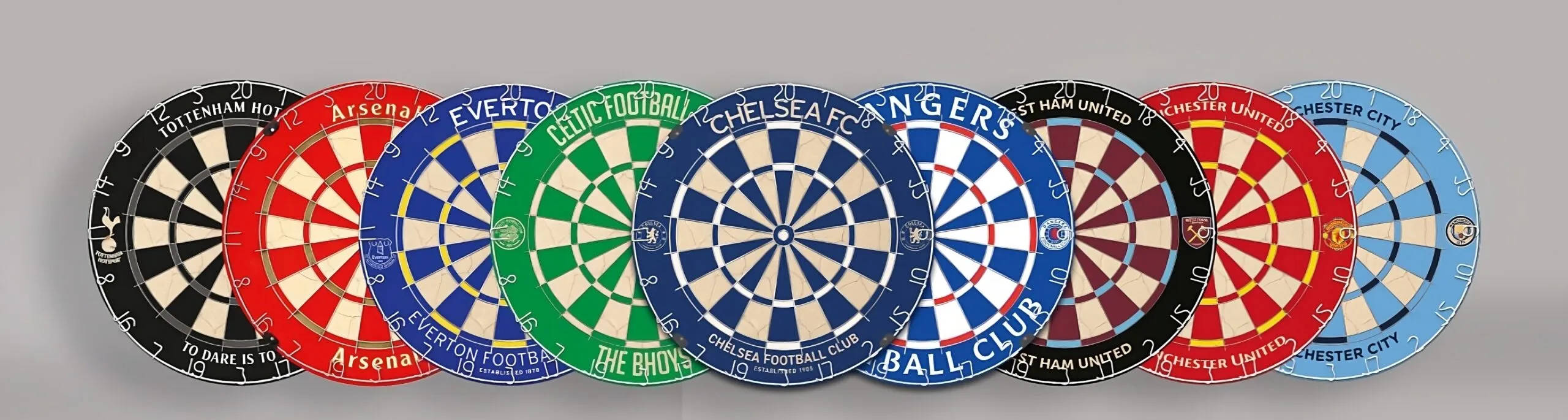 A row of football club dartboards for Tottenham, Arsenal, Everton, Celtic, Chelsea, Rangers, West Ham, Manchester United and Manchester City